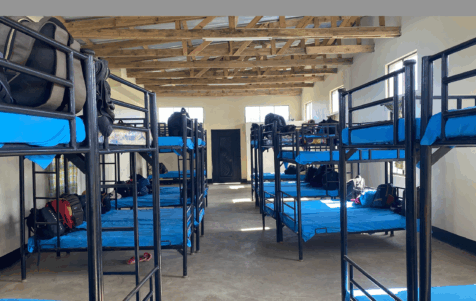 Rows of bunk beds in a dorm room