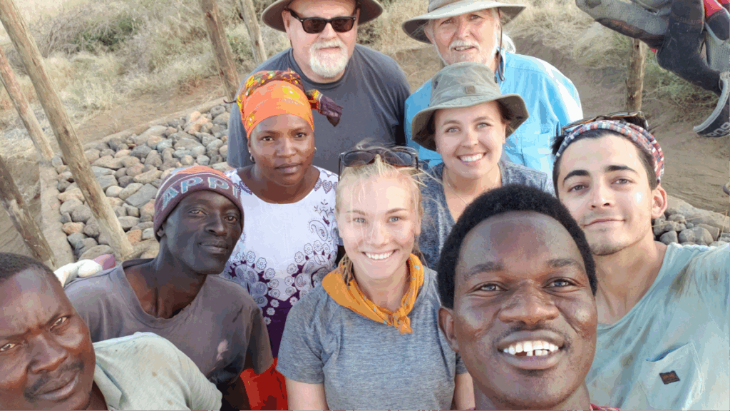 A group of people standing outside