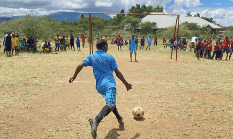 Students playing soccer