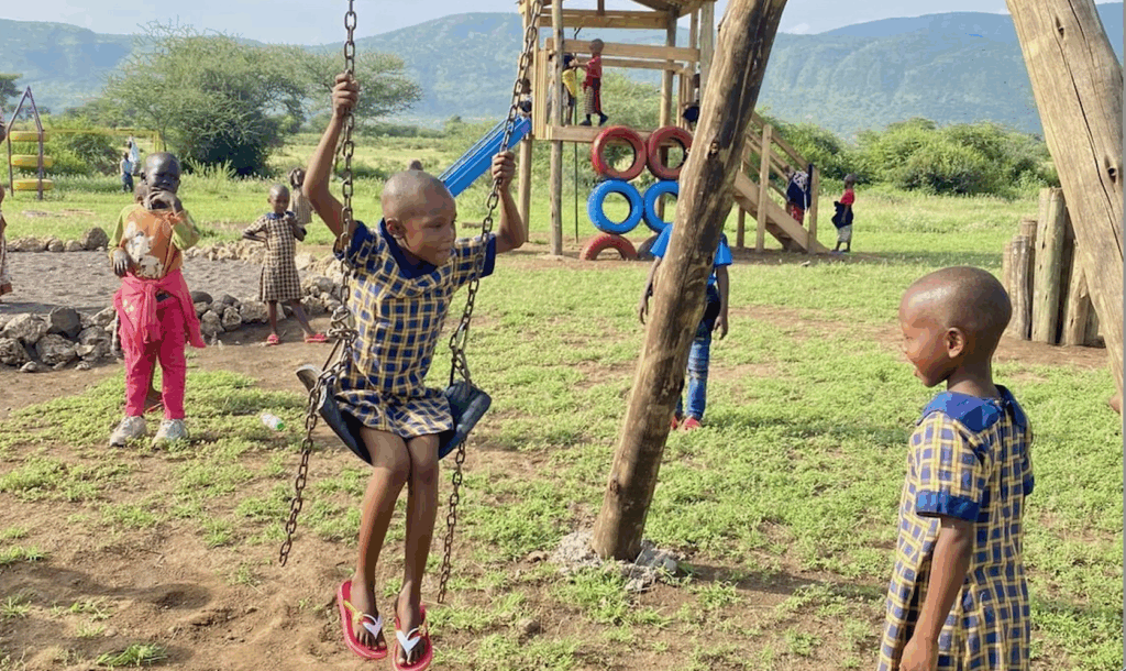 Students outside playing on a play ground